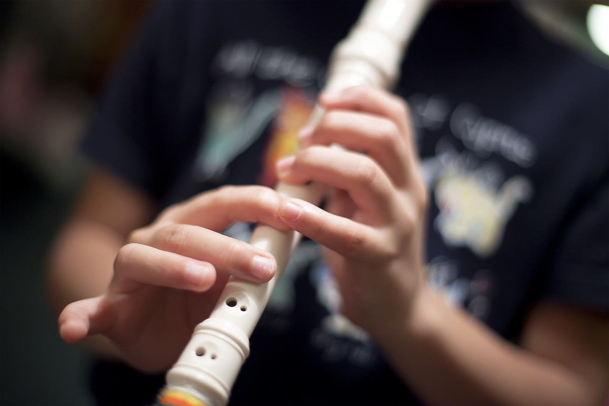 Playing recorder. Playing recorder